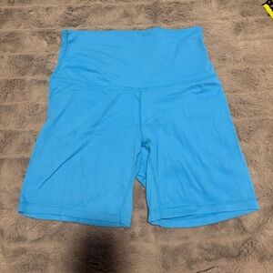 Love Tree High-Rise Bike Shorts in Bright Aqua Blue